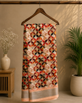 Elegant beautiful printed saree featuring a modern geometric floral pattern in warm shades of red, peach, brown, and black - Cotton Saree
